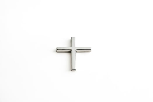 Silver Cross on White Background photo
