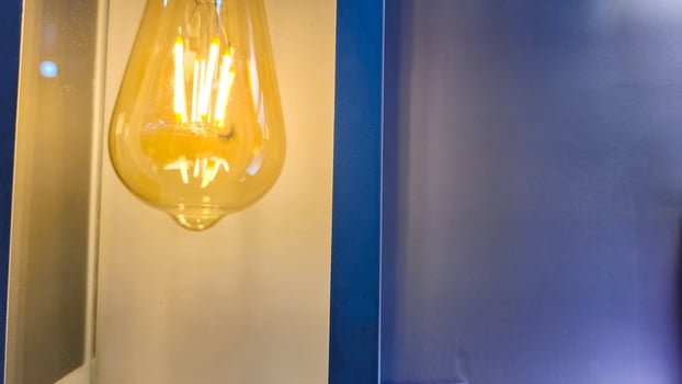 lighting background with yellow bulbs photo