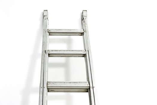 White Metal Ladder Against White Background photo