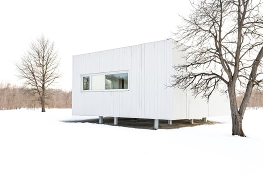 Modern White Cabin in Winter Wonderland photo