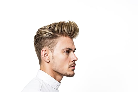 Portrait of a man with blonde hair and a white shirt photo