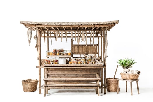 Wooden Market Stall with Jars and Baskets photo