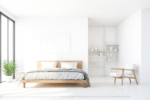 Minimalist White Bedroom with Wooden Bed and White Shag Rug photo