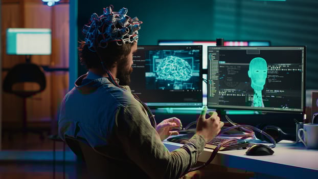 Computer engineer trying to make EEG headset work, researching brain machine transferring. Man doing SF online consciousness uploading, trying to transcend out of simulation, camera A photo