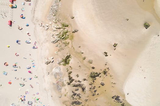 people enjoying the beach in summer, aerial top view with a drone. Summer concept background photo