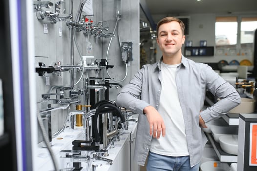 Man chooses a products in a sanitary ware store photo