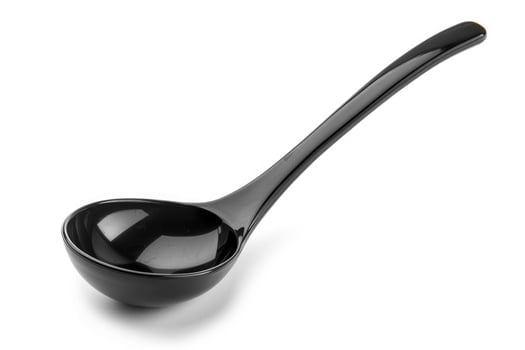 Black plastic soup ladle on a white background. photo