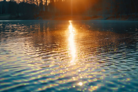 Seascape Sunlight Casting Golden Glow on the Surface of Lake nature background photo