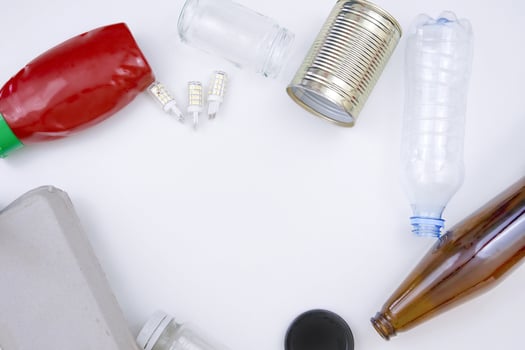 Assorted Recyclable Items on White Background photo