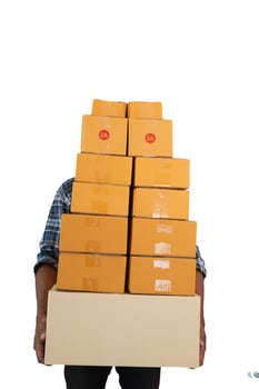 parcel boxes being packaged and ready to be sent to customers who have placed online orders within the online store's system. A small SME businessman has prepared the parcels and is ready for delivery photo
