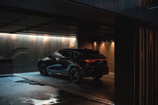Luxury SUV Parked in Upscale Urban Garage Showcasing Spacious Interior and Premium Materials photo