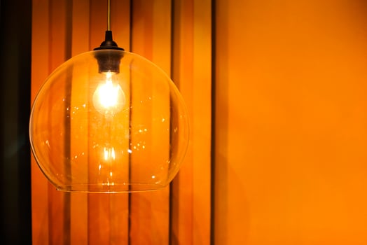 Glowing lamps hanging on ceiling photo