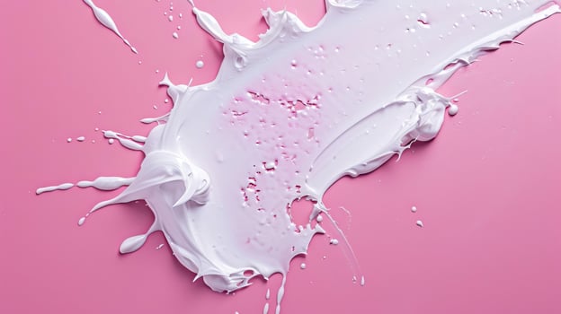 Macro crane shot of white facial cream smears on pink background Facial cream advertisement photo