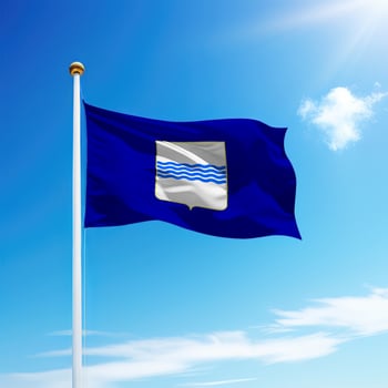 Waving flag of Basilicata is a region of Italy on flagpole photo