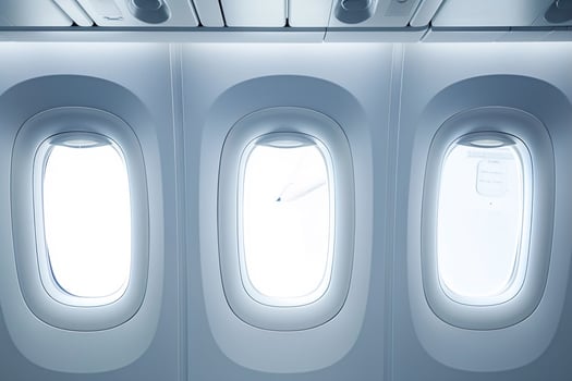 Airplane Cabin Windows with Bright Light. photo