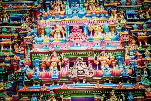 Sculptures on Hindu temple tower photo