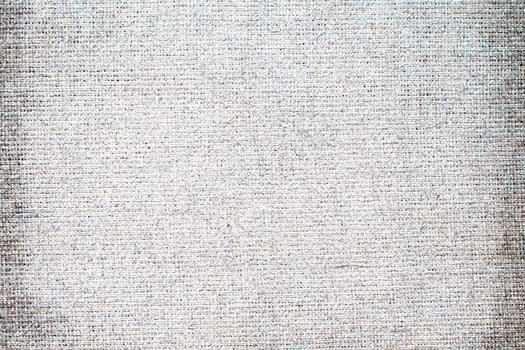 Natural linen material textile canvas Fabric texture background Close-up detail of fabric natural color Hemp material pattern design wallpaper. can be used as background or for graphic design photo