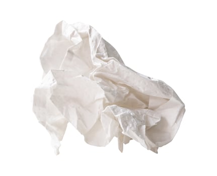 Front view of single white screwed or crumpled tissue paper ball isolated on white background with clipping path photo