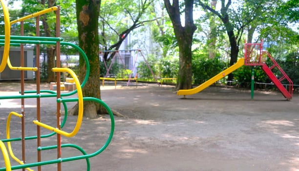 Yellow joyful slide and climbing frame for child and kids in Japan playground photo