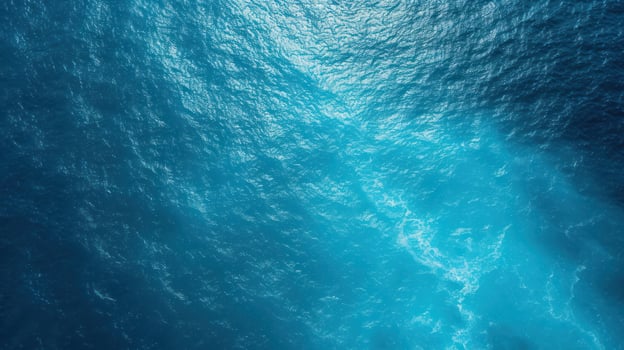 a body of water with small islands surrounded by the ocean, photo