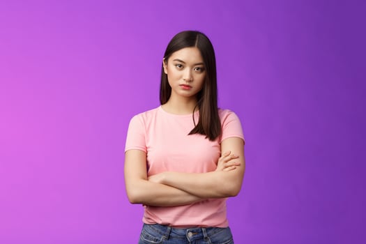 Bothered and pissed asian woman brunette, cross arms chest block, feeling offended annoyed, stare dismay disappointment, stand purple background upset irritated, fed up listen excuses photo