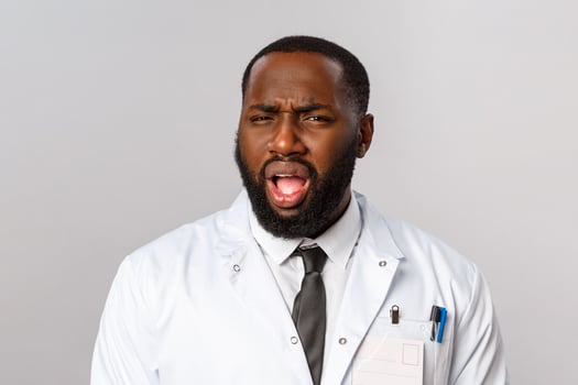 Healthcare, medicine and hospital treatment concept. What the hell are you talking about. Frustrated and displeased african-american doctor, therapist cringe, grimacing with disbelief at camera photo