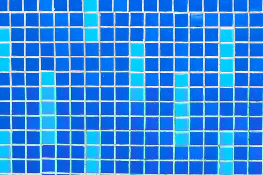 Texture of blue mosaic tiles, close-up photo