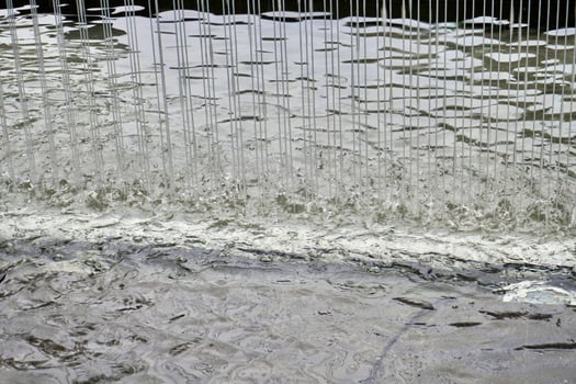 Water curtain droplets texture isolated on horizontal background. photo