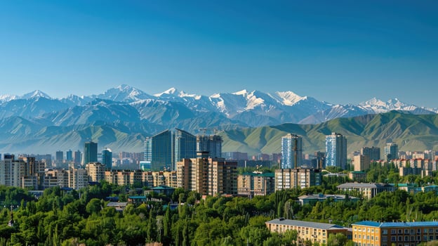 A panoramic view of Almaty's skyline with the majestic mountains in the background. photo