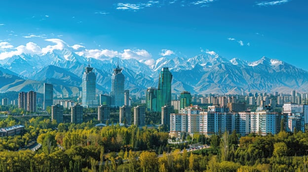 A panoramic view of Almaty's skyline with the majestic mountains in the background. photo