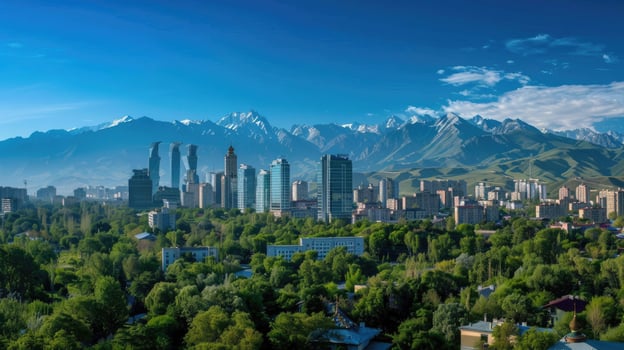 A panoramic view of Almaty's skyline with the majestic mountains in the background. photo