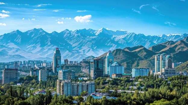 A panoramic view of Almaty's skyline with the majestic mountains in the background. photo