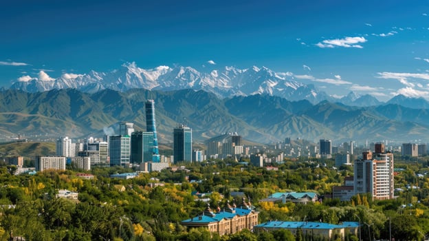 A panoramic view of Almaty's skyline with the majestic mountains in the background. photo