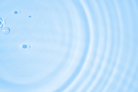 Abstract transparent water shadow surface texture natural ripple on blue background photo