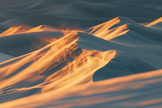 Nature Background of Sand Dunes Glowing in the Warm Light of Sunset photo