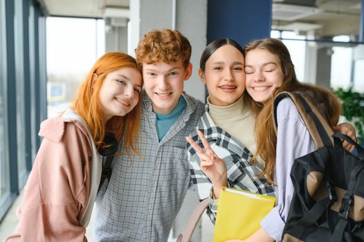 College Friendship Concept. Happy Group Of Students Posing photo