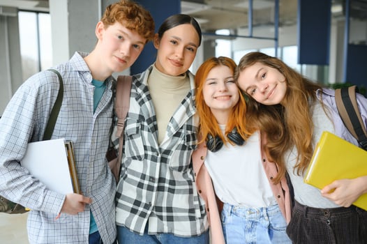 group of young college students in classroom photo