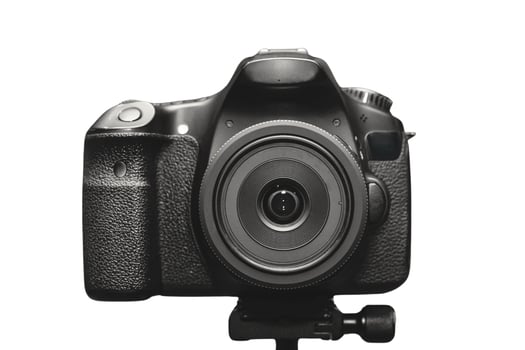 a front view of DSLR camera with white background photo