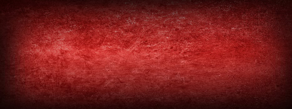 Red textured concrete grunge wall background. Dark edges. photo