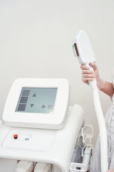 Laser hair removal treatment. Doctor holding. Clinic skin care procedure. Medical dermatology photo equipment. People device. Cosmetology technology salon epilation. Body aesthetic concept