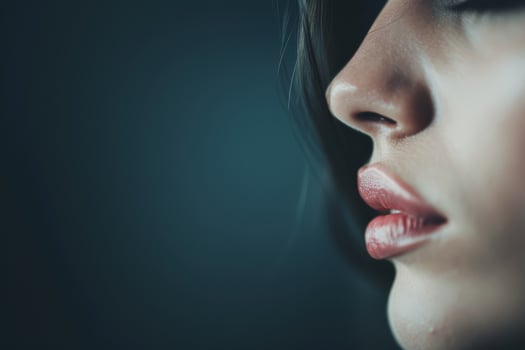 Woman's Profile With Pink Lipstick photo