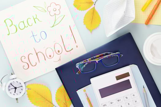 School supplies on a tablet and inscription Back to school photo