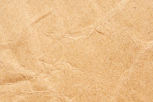 Abstract crumpled and creased recycle brown paper texture background photo