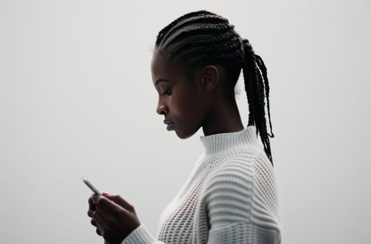 Woman Using Smartphone in Hallway photo