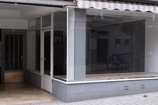 windows of a desolated shop photo