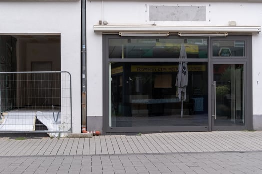 windows of a desolated shop photo