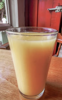 Orange fruit juice in restaurant PapaCharly Playa del Carmen Mexico. photo