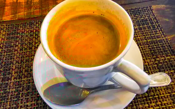Cup of americano black coffee in restaurant cafe in Mexico. photo