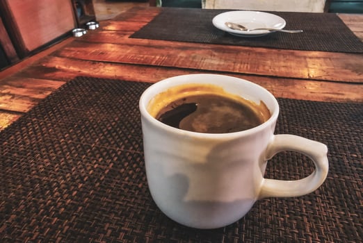 Cup of americano black coffee in restaurant cafe in Mexico. photo