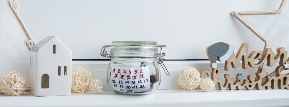 Original Advent Calendar made of glass jar and sweet chocolate candies Christmas concept. Countdown till winter holidays. Handmade advent calendar. Step by step DIY crafts do it yourself photo